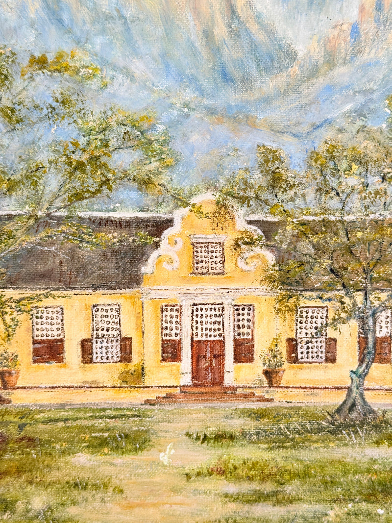 A painted scene of a yellow house with brown shutters and a dark roof, surrounded by trees and grass under a blue sky with soft brushy clouds.