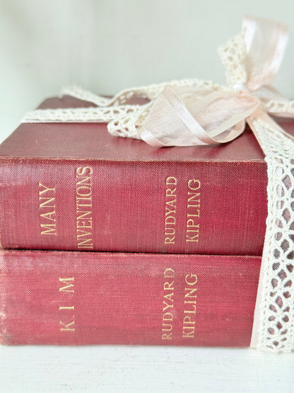 Vintage Rudyard Kipling book bundle of Kim and Many Inventions in red hardback covers, photographed on a white surface