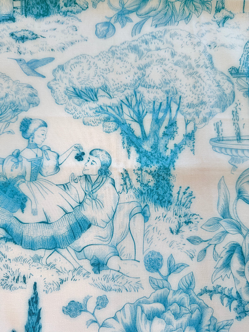 The Blue Loft toile cotton tea towel in turquoise on white with rural scenic print