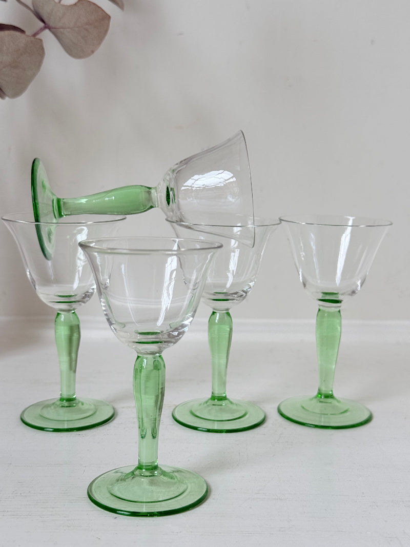 Set of five green stemmed liqueur glasses