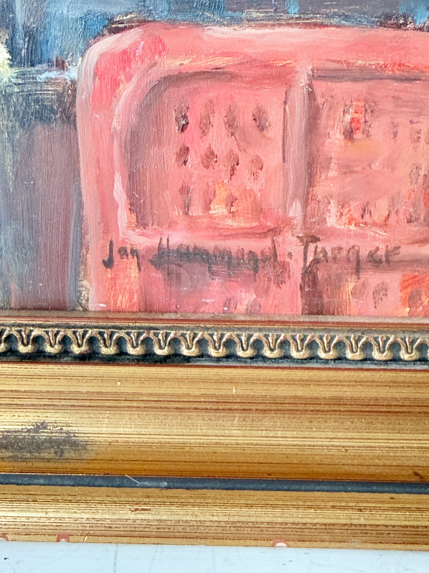 Impressionist oil on board of a busy fruit market with figures and awnings in a gilt frame