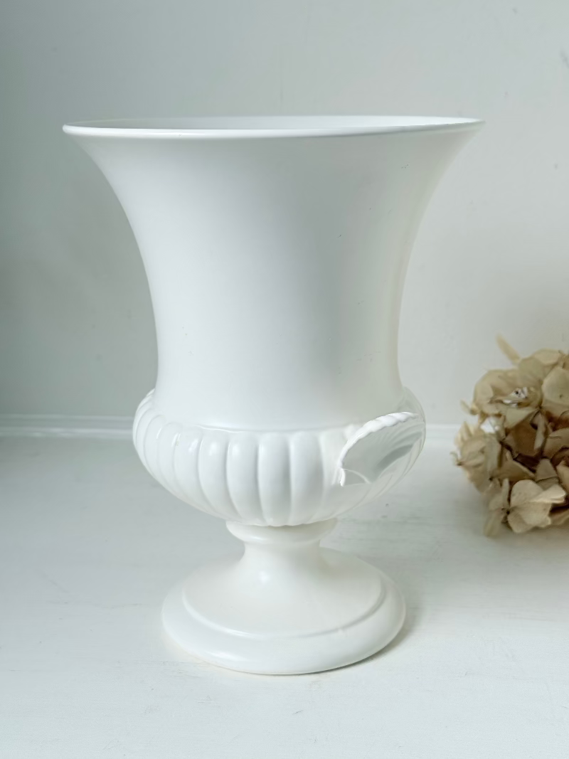 Vintage Wedgwood white urn vase with handles, photographed on a white surface