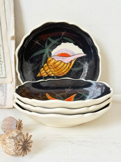 Set of 4 vintage Henriot Quimper faience plates with hand painted shells, starfish, seaweed and black ground decoration