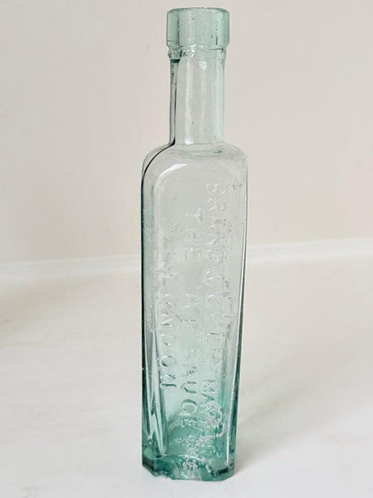 Trio of Antique Aqua Glass Bottles with Embossed Lettering