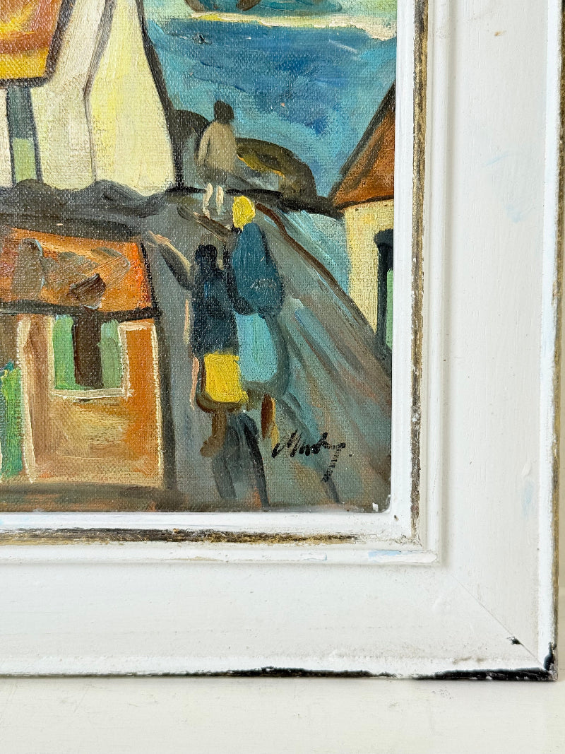 Mid century Irish school oil painting of seaside village, blue and ochre tones, photographed on white surface