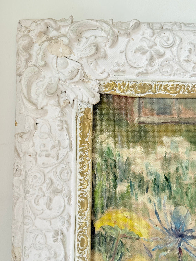 Framed floral oil painting on board by Muriel Hester Broughton, 1970, shown on a white surface with decorative carved frame