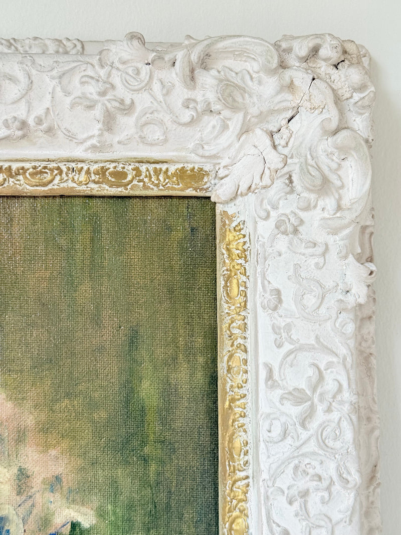 Framed floral oil painting on board by Muriel Hester Broughton, 1970, shown on a white surface with decorative carved frame