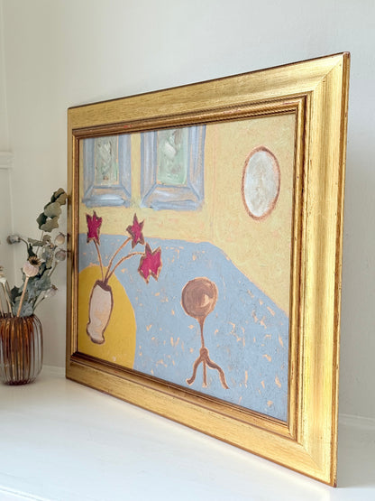 Naïve interior oil painting with red flowers in a vase, in golden frame, styled on a white dresser with neutral background