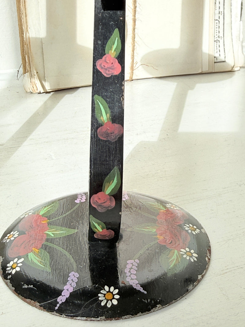 Domed base of a vintage toleware candlestick with roses and daisies